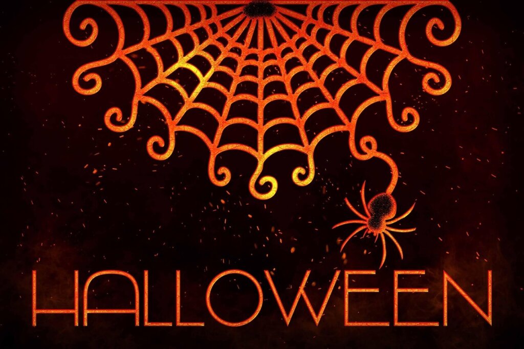 cristão-pode-brincar-halloween um desenho de teia de aranha, com uma aranha e a palavra halloween